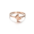 Detail of rose gold butterfly ring featuring frosted wings with sparkling texture - US 5 / Butterfly