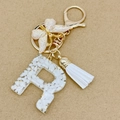 Letter R keychain with white marble pattern, gold butterfly charm and white tassel - Letter R