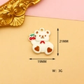 Detailed macro view of white bear alloy pendant with red cherries and size dimensions - White Cherry Bear