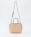 Minimalist faux leather crossbody handbag in a soft beige pink with gold hardware - Nude Pink