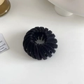 Macro detail of black velvet bird nest hair clip with retractable multi-layer teeth - Flocked Black