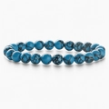 Blue turquoise bead stretch bracelet with natural black matrix veins on white background - Dark Blue Turquoise