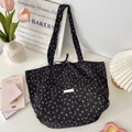 Detail of floral chiffon tote bag with bubble texture and yellow flower patterns on black - Black Floral