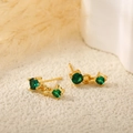 Minimalist gold metal earrings featuring dual round green gemstones in elegant setting - Double Green Gemstone Gold Studs
