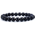 Macro shot of polished black agate beads on an elastic bracelet with reflective finish - Black Agate Bracelet 8mm