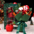 Santa Claus doll bouquet in green gift bag with Merry Christmas ribbon and fake berries - Christmas Bouquet Green