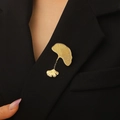 Golden ginkgo leaf brooch with dangling pendant on black suit jacket lapel - Dangling Ginkgo Leaf Style (12 Titanium Gold A-545)