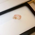Elegant rose gold hollow geometric chain open ring shown on white jewelry tray - Rose Gold Geometric Grid
