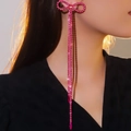 Luxurious long tassel bow earrings with sparkling magenta crystals and rhinestones - Rose Pink Bow Long Fringe