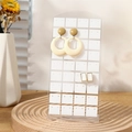 L-shaped transparent acrylic 72-hole earring display stand with gold jewelry - Transparent White Grid
