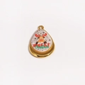 Detailed close-up of a gold reindeer Christmas pendant with enamel finish for DIY jewelry - Reindeer