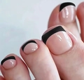 Close-up of minimalist black French line design on nude pink short false toenails - French Black Line Style - Includes Yellow Jelly Glue (FW120)