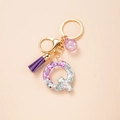 Letter Q alphabet keychain with colorful sequins, purple tassel, and golden hardware - Letter Q