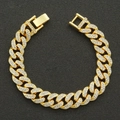 Bracciale cubano da uomo color oro con strass scintillanti su sfondo nero materico - 7 pollici / Oro