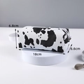 Waterproof cow print makeup bag in PU leather, size 18x6.6x6.8cm with side handle - X-209 Storage Pouch/Black White Cow Pattern