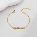 Golden Sagittarius zodiac bracelet with cursive lettering and adjustable chain link - Sagittarius Gold