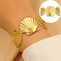 Elegant gold fan-shaped shell bracelet with matte metallic texture for women - Matte Scallop Design