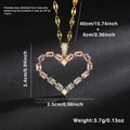 Macro shot of gold heart pendant with colorful zircons and precise size measurements - Colorful Zirconia Heart (XL10505-1)