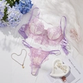 Detail of purple floral lace lingerie set with embroidery on soft mesh fabric - S / Purple