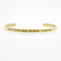 Golden 4mm stainless steel cuff bracelet engraved with Sisters are forever friends - SISTERS are forever friends...