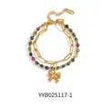 Detail of layered stainless steel bracelet with golden bow pendant and colorful beads - Multicolor Beaded Style (YYB025117-1)