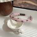 Pink fabric headband with black bow patterns and a woven Hand Made label decoration - Pink-Bowknot