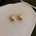Golden crescent stud earrings with unique hammered texture in a French vintage style - Gold