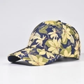 Detail view of navy blue floral baseball cap with yellow flower prints at 45 degree angle - Style 01 / Navy Blue with Yellow Flowers