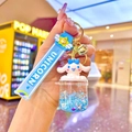 Detail of Cinnamoroll keychain featuring blue liquid sand bottle and unicorn wrist strap - Blue Luminous Big Belly Cup