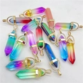 Close-up of hexagonal crystal pendants with golden caps in various gradient colors - Gradient Purple Yellow Green