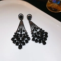 Elegant black teardrop chandelier earrings with faux crystals in gothic black plating - Black Teardrop Gorgeous Tiered Style