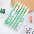 Set of 6 retractable gel pens featuring green dinosaur patterns and cute stationery designs - New Little Dinosaur