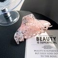 Pink and white marble acetate hair claw clip with high gloss finish on black background - Maiden Pink 10cm