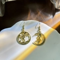 Elegant gold-tone ballet dancer drop earrings with white crystal accents and sunset lighting - Gold Asymmetric Ballet Dancer Dangle