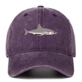 Close-up of premium shark embroidery on washed dark purple cotton baseball cap fabric - Purple