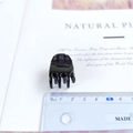 Close-up of 2cm mini square hair claw clip in black finish with measuring ruler - 2cm / Glossy Black