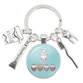 Silver dental keychain featuring toothpaste, toothbrush, floss and tooth charms - Dentist Scene Illustration (35)