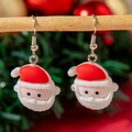 Boucles d'oreilles Père Noël artisanales en résine avec bonnets rouges et barbes - Cercle Visage du Père Noël