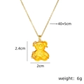 Golden water wave chain necklace featuring a transparent yellow resin bear pendant - Yellow Cross Chain