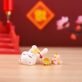 Lucky cat resin figurine in white with gold coins on a festive pink base - Rolling Wealth Cat (1081-18)