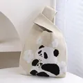 Chic cream knitted knot bag featuring a cute panda and floral embroidery pattern - Beige Floral Panda