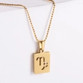 Macro shot of 18k gold plated square pendant with Capricorn constellation cutout detail - Capricorn