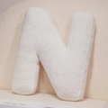Plush white Sherpa letter N throw pillow for cozy home decor and sofa cushioning - Letter N