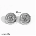 Detail view of 26mm silver vortex earrings with hammered texture weighing 9.5g - Silver Round Hammered Spiral (TE60659-S)
