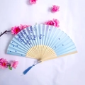 Blue folding fan with cherry blossom pattern, light wood ribs and matching blue tassel - Blue Cherry Blossom Wood Frame Style (Women's Fan-25)