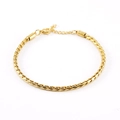 Bracelet fin pour femme en acier inoxydable plaqué or 18 carats sur fond blanc - 1.2mm Largeur / 18+3cm Longueur / Doré