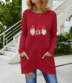 Detail of red Christmas gnome print tunic with functional side pockets and curved hem - S / Tops / Bright Red