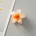 Frangipani claw clip featuring white petals with an orange gradient and glitter finish - Candy Orange [4cm Mini]