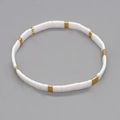 Bracelet Tila minimaliste avec perles carrées blanches émaillées et dorées alternées - Blanc Or Minimaliste Élastique