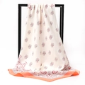 Detail of soft paisley satin square scarf in cream with red and orange border accents - Orange Edge Beige Paisley (011)